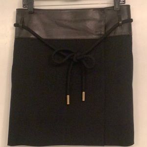 Gucci mini wrap around skirt;wide leather upper trim;belt insert with  gold trim